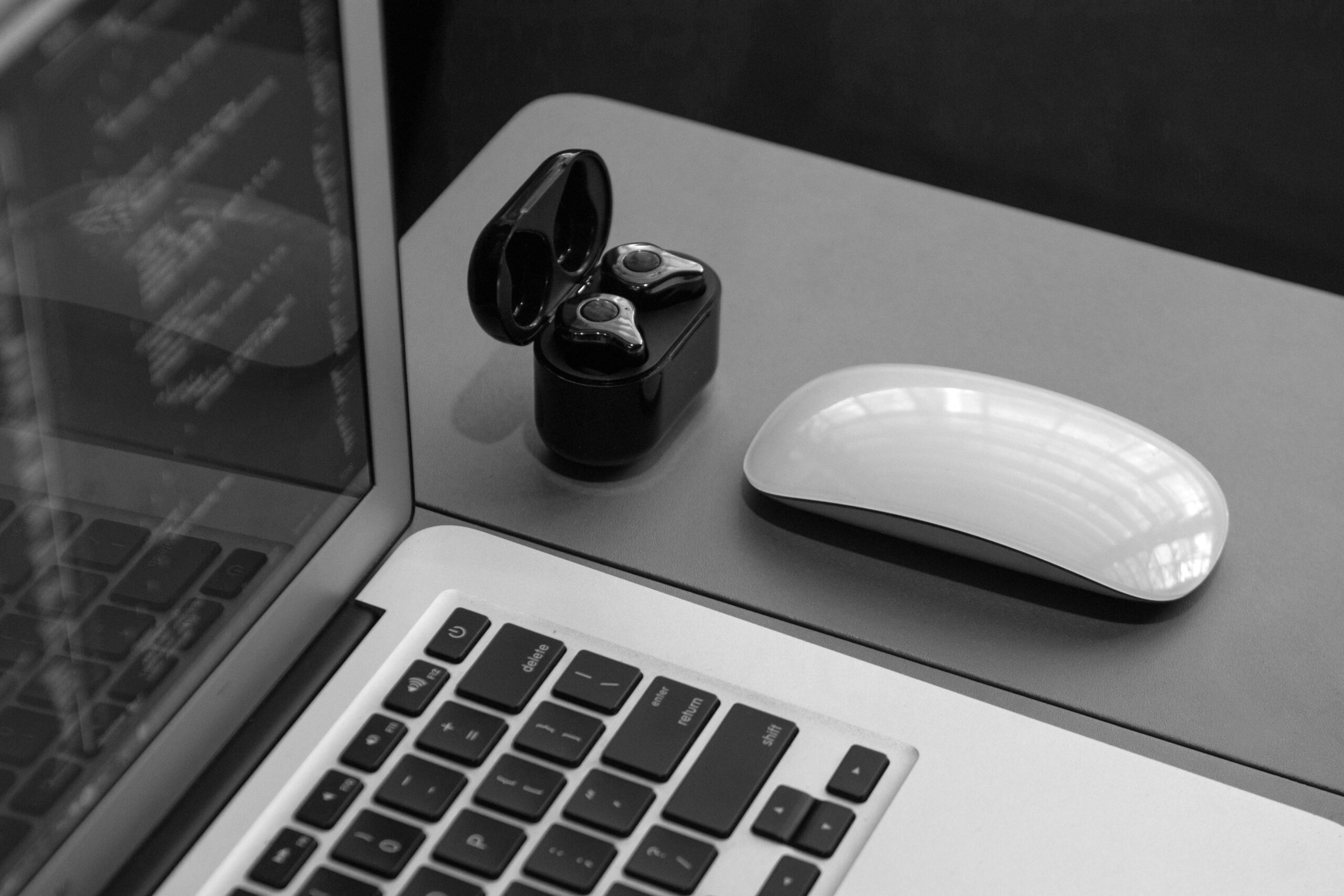 Desk and Gadgets gray and black laptop computer on surface